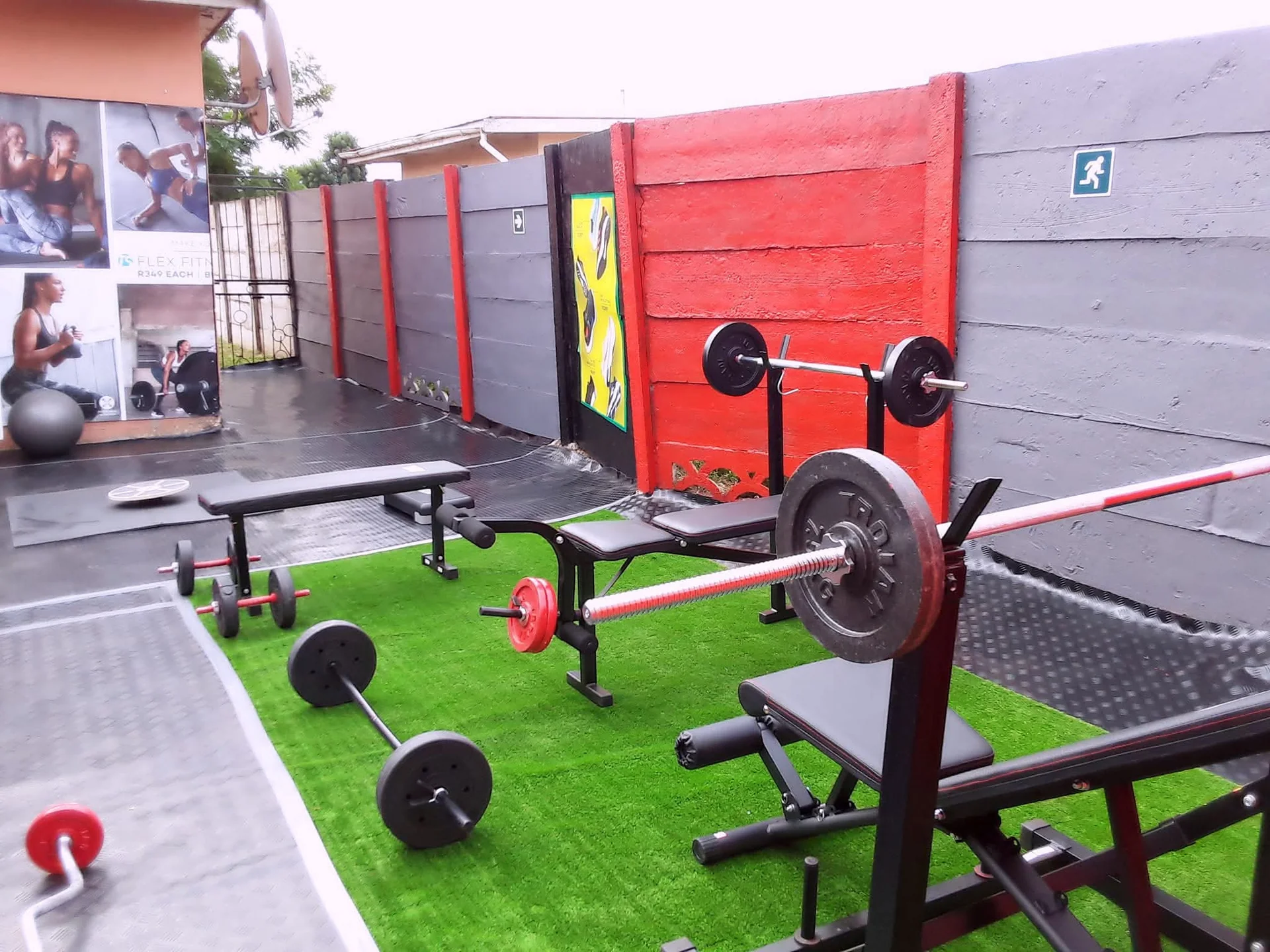 Main training floor at Access Fitness24 with rows of modern weight machines and free weights